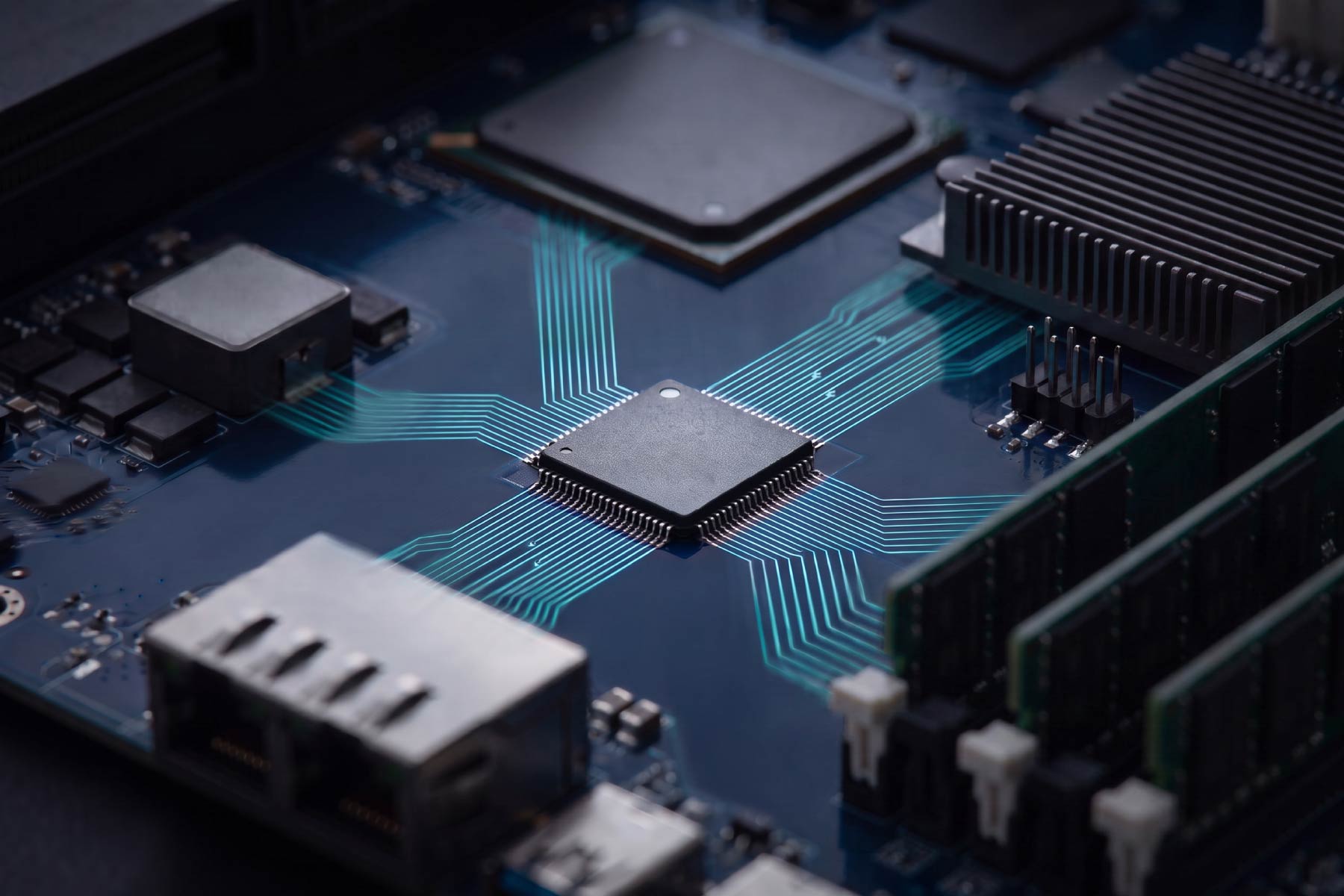 A small firmware controller chip at the center of a server motherboard, teal traces connecting it outward to memory, networking, cooling and power components, representing firmware as the connective layer of AI infrastructure.