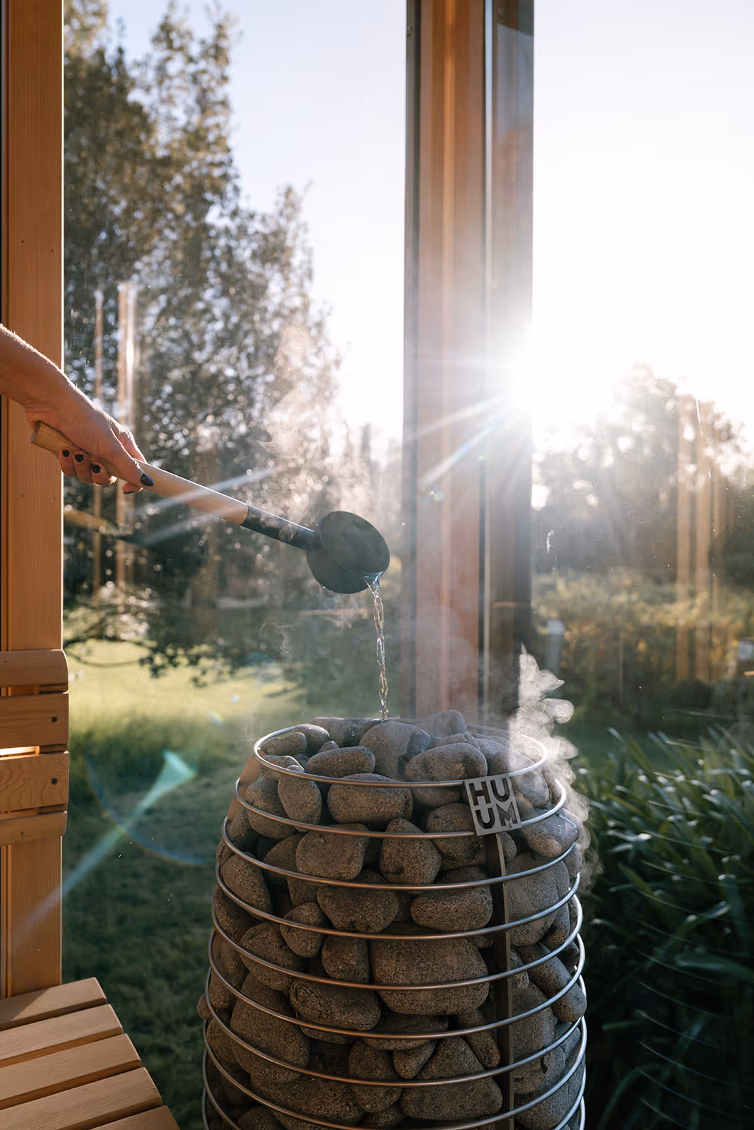 Sunrise over an outdoor sauna