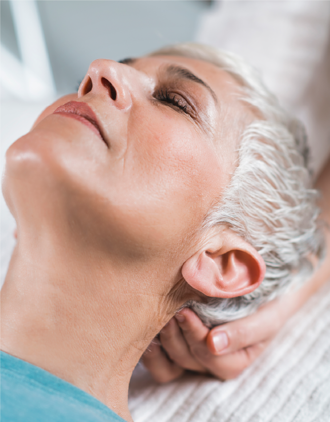Woman getting neck massage