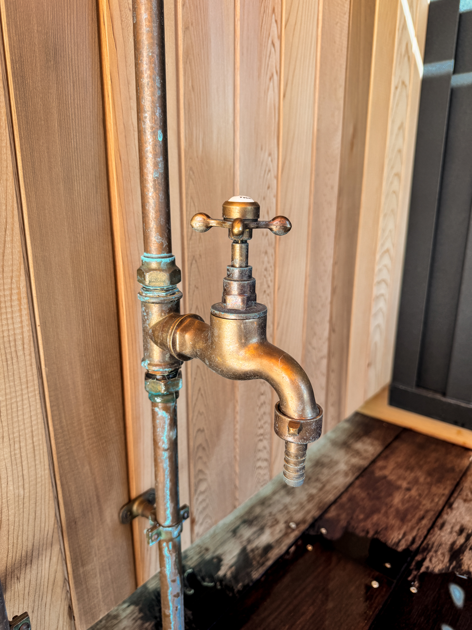 Inline foot wash tap