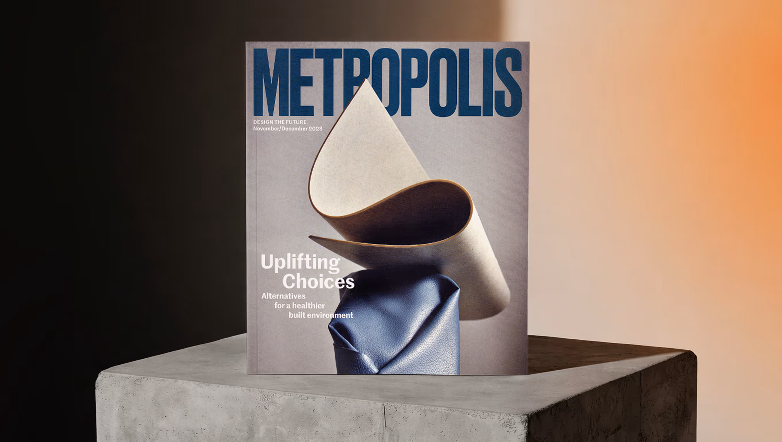 Metropolis magazine cover featuring abstract art with curved beige and blue textured shapes, titled 'Uplifting Choices: Alternatives for a healthier built environment'.
