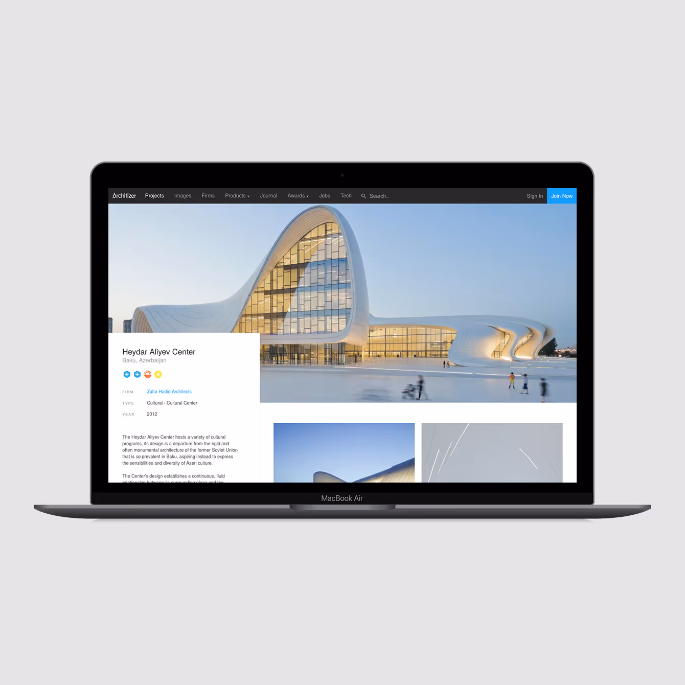 MacBook Air laptop displaying a webpage featuring the Heydar Aliyev Center in Baku, Azerbaijan, with images and architectural details.