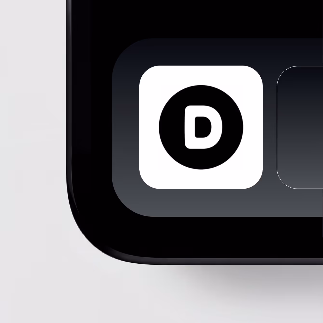 Close-up of a mobile device screen corner showing a white app icon with a black letter D inside a black circle.