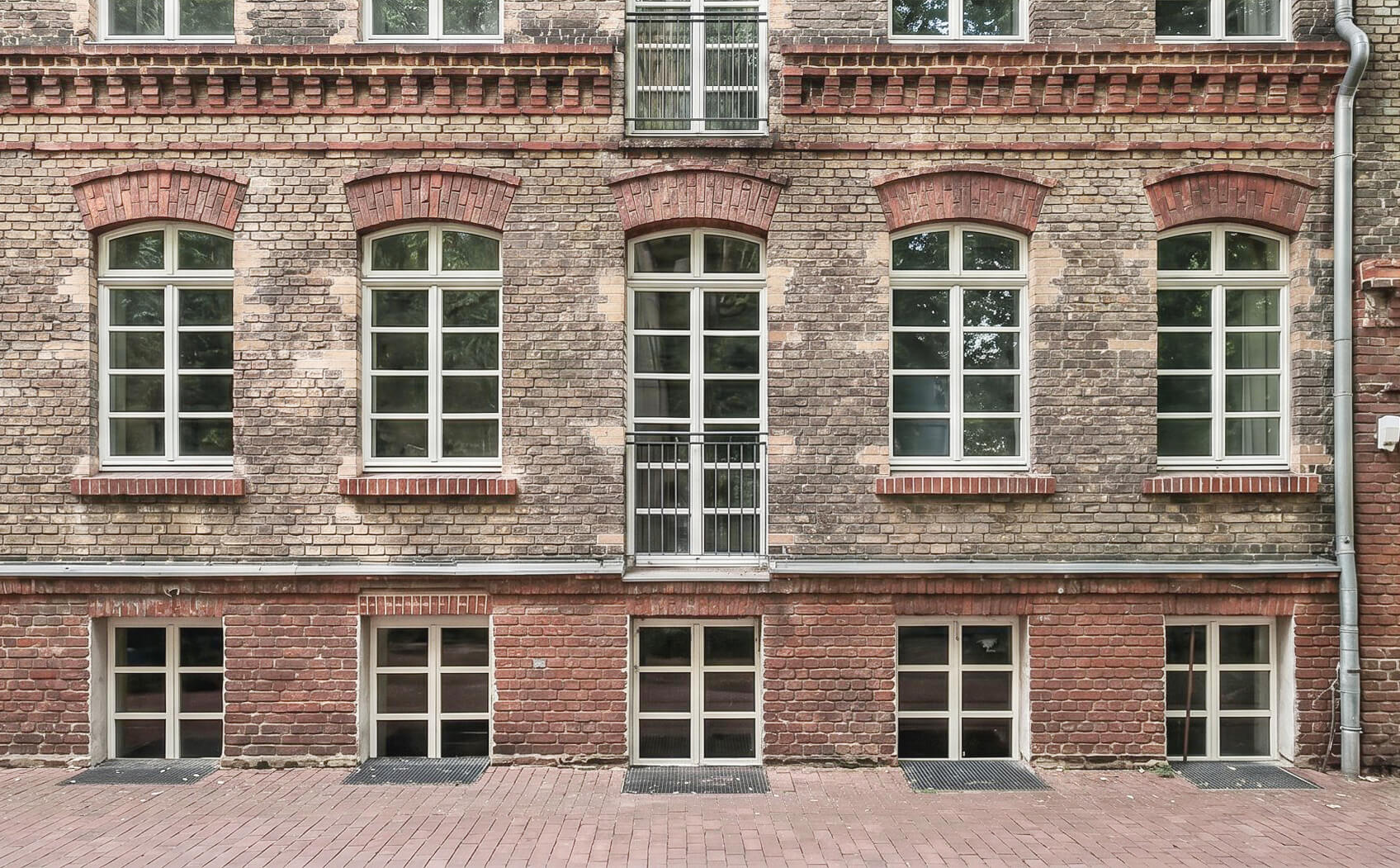 The brick facade of The Hinterhaus in Berlin Friedrichshain