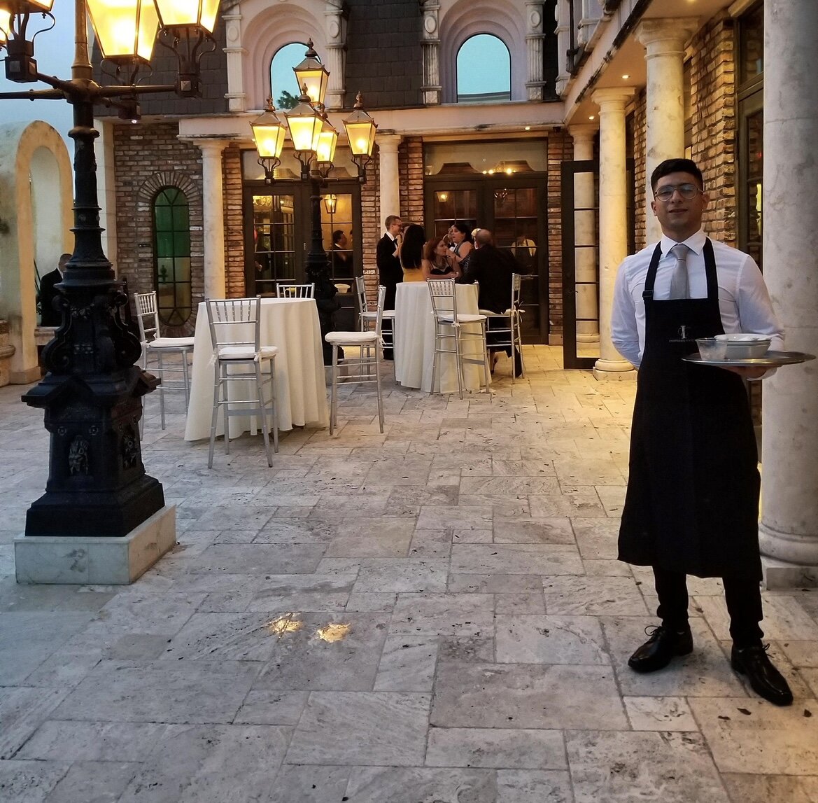 image of volunteers offering food at a harmoniously arranged ethereal canteen setting