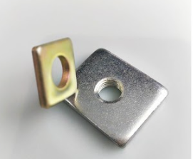 Close-up of a metallic square washer with a central threaded hole and a bent section with another hole.
