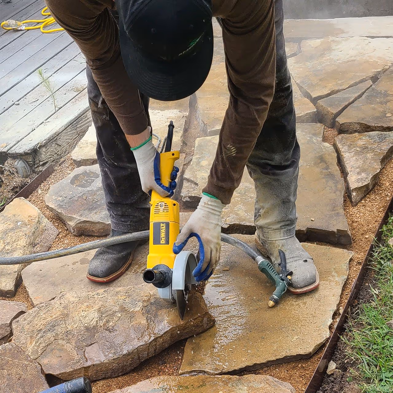 Custom hardscaping installation including patios and retaining walls by Reservoir Landscape Solutions Cedar Creek Lake TX