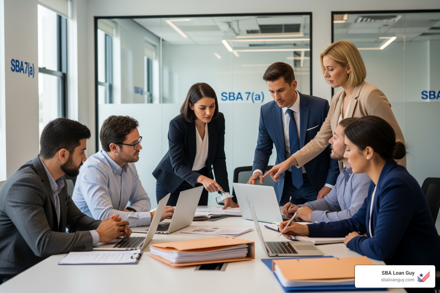 Individuals coming together to review a client's SBA 7(a) loan application - SBA 7a loan application
