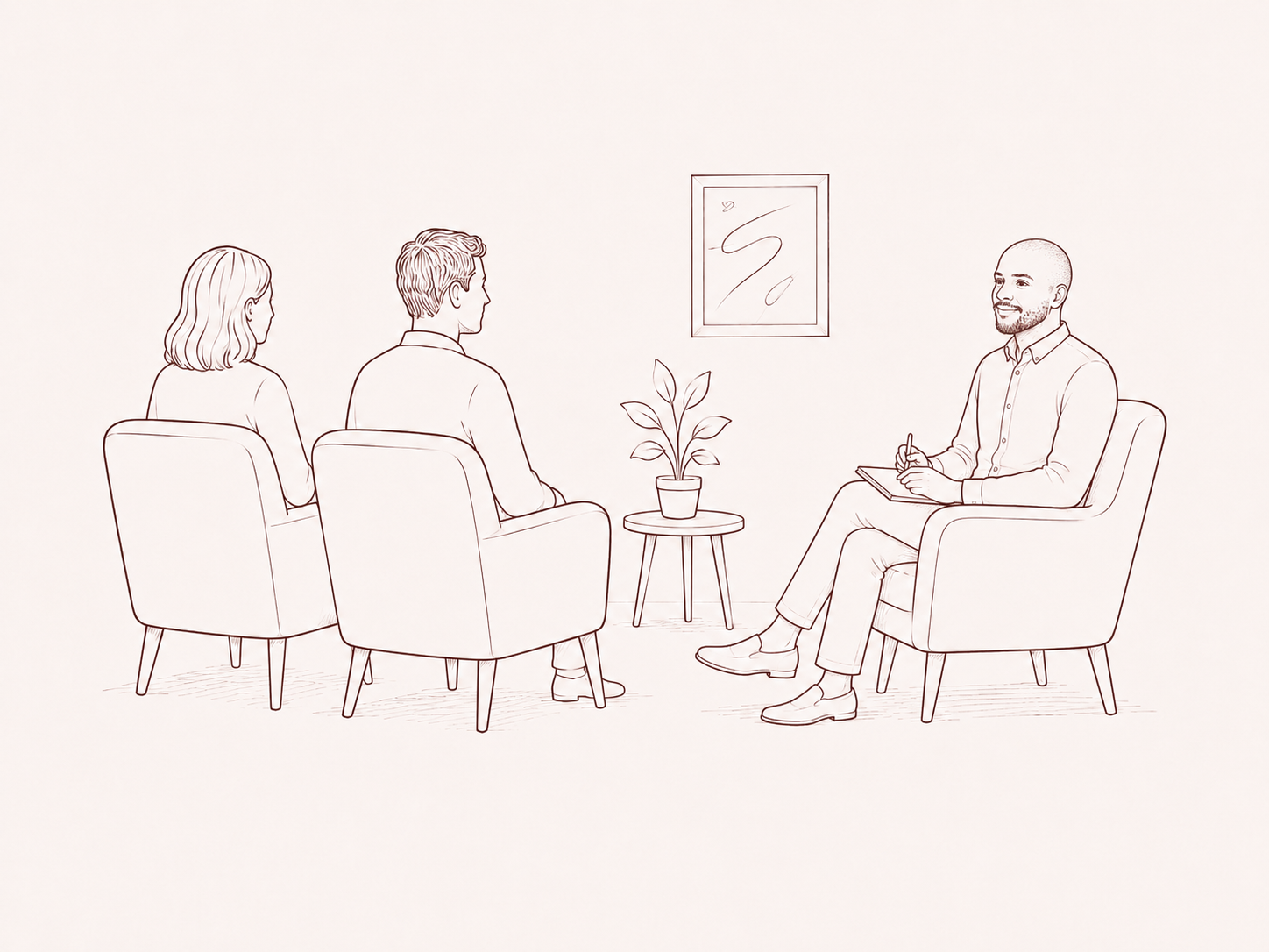 Two seats for a couple facing a therapist's chair
