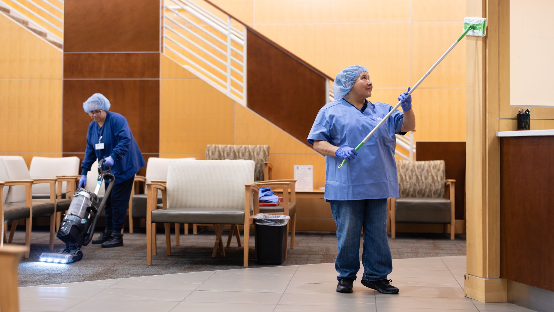 Two janitors clean a Seattle-area medical office facility