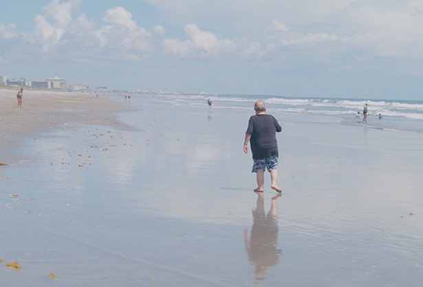 image of parents and staff discussing enrollment