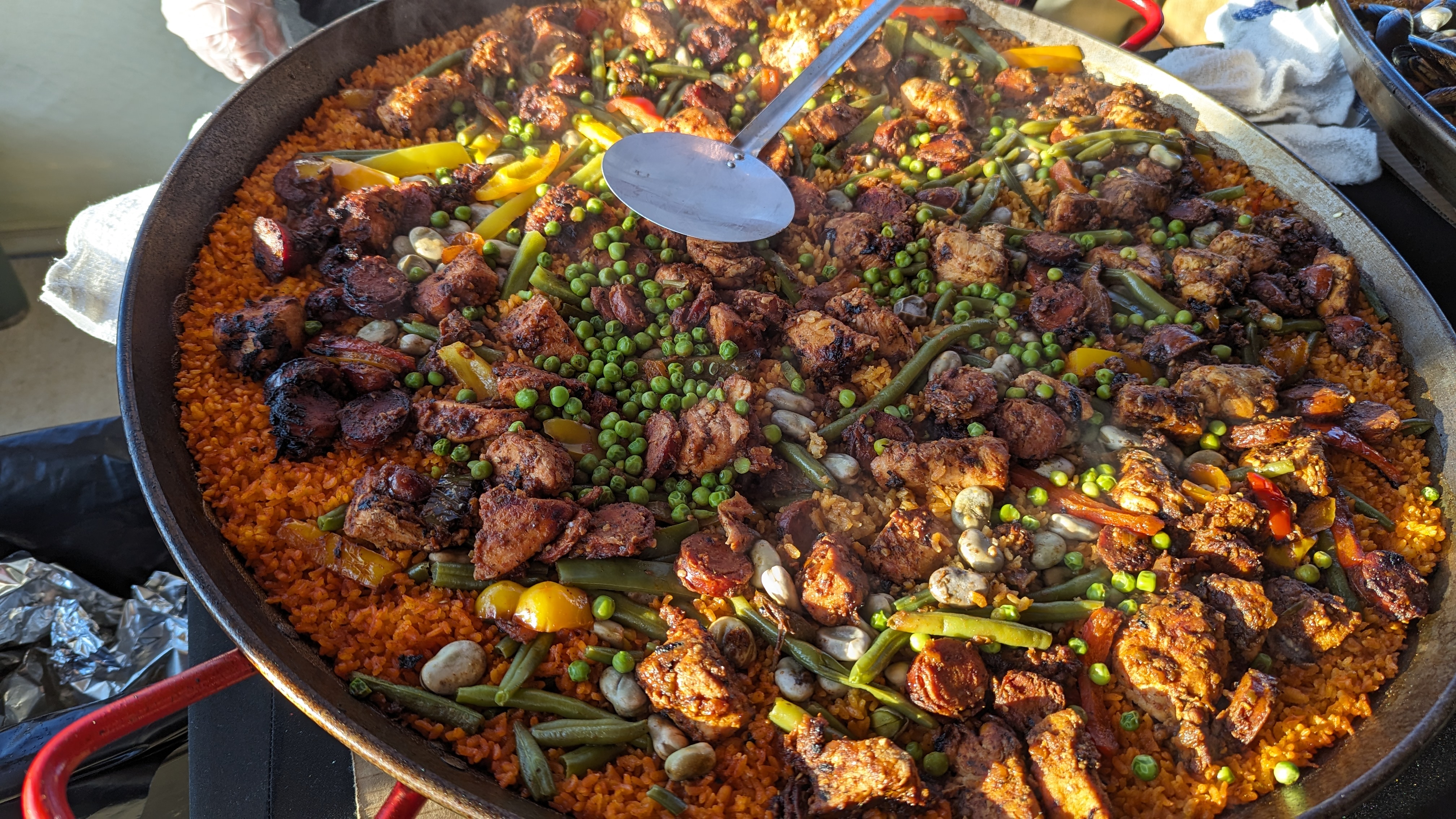 Chicken and vegitable paella prepared on-site at catering event
