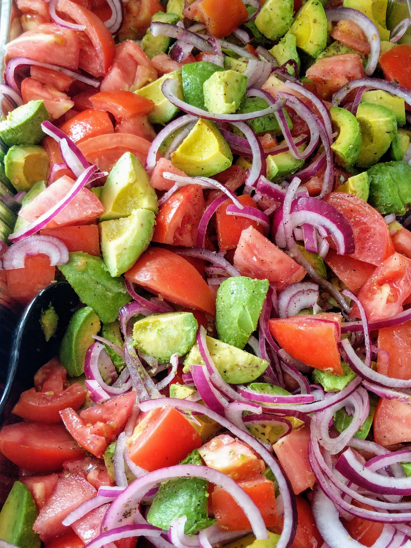 Freshly prepared tomato and avaocado Salad at catered event