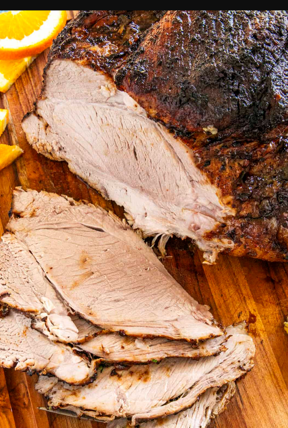 Cuban pernil freshly carved at catered event