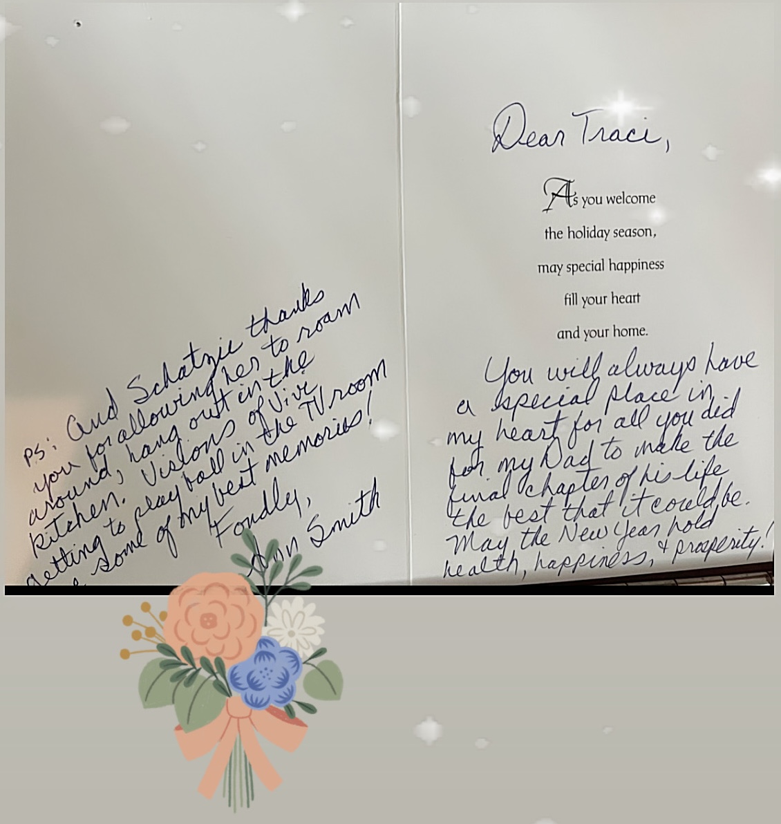 Open holiday card with printed greeting and handwritten messages expressing gratitude and warm wishes.