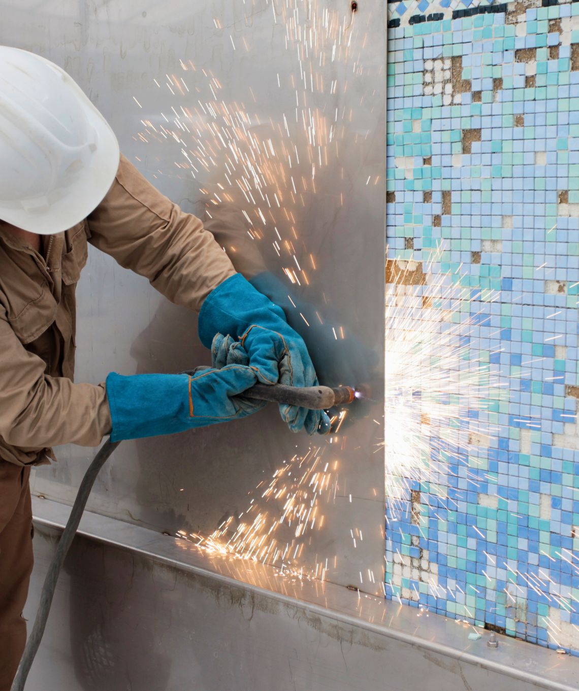 Stainless steel pool welding and repair underway at Ardmore Park by Innovez Engineering.