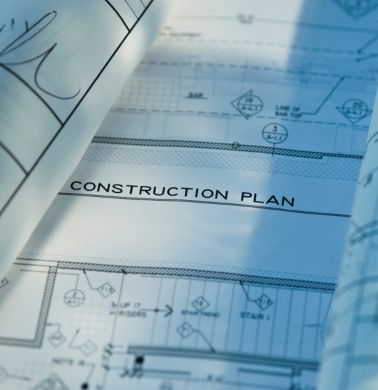 The details of a swimming pool construction plan is laid out in print and diagrams.