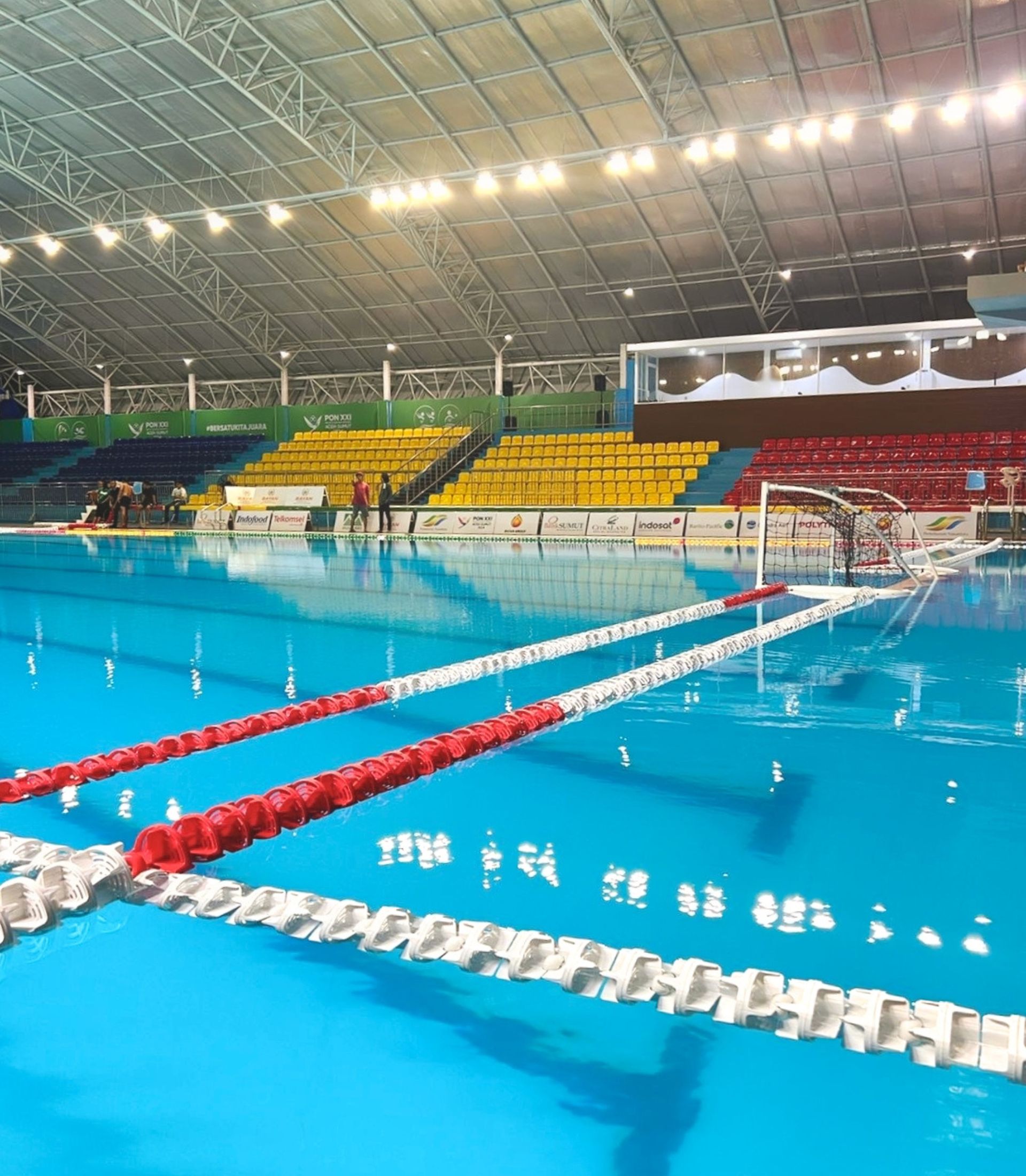The wide range of pool equipment and accessories Selayang Aquatic Centre in Medan, North Sumatra, including: swimming pool lane ropes, a water polo net, and other essential pool fixtures.