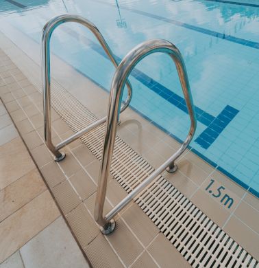 Stainless steel grab rails installed at the Singapore Island Country Club, during pool rectification works by Innovez Engineering.