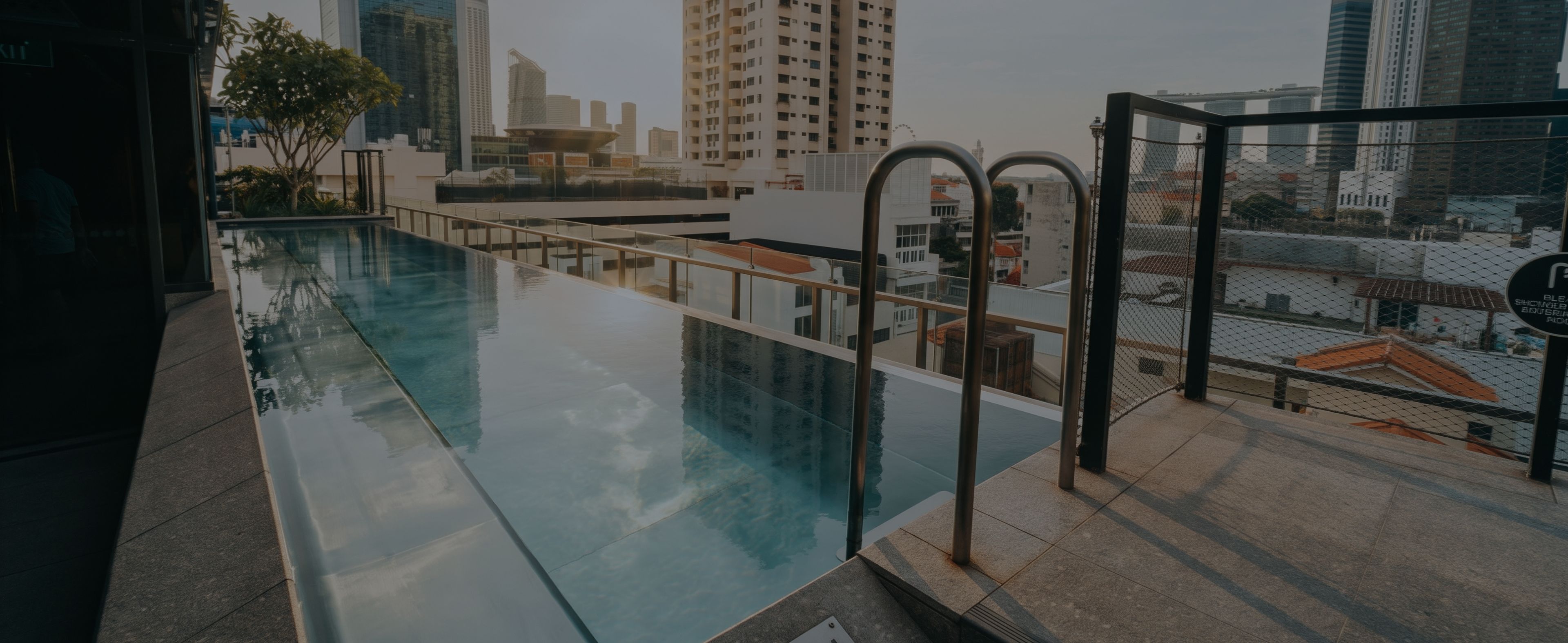 Contact us at Innovez Engineering. The new stainless steel lap pool at 21 Carpenter is featured in the hero image.