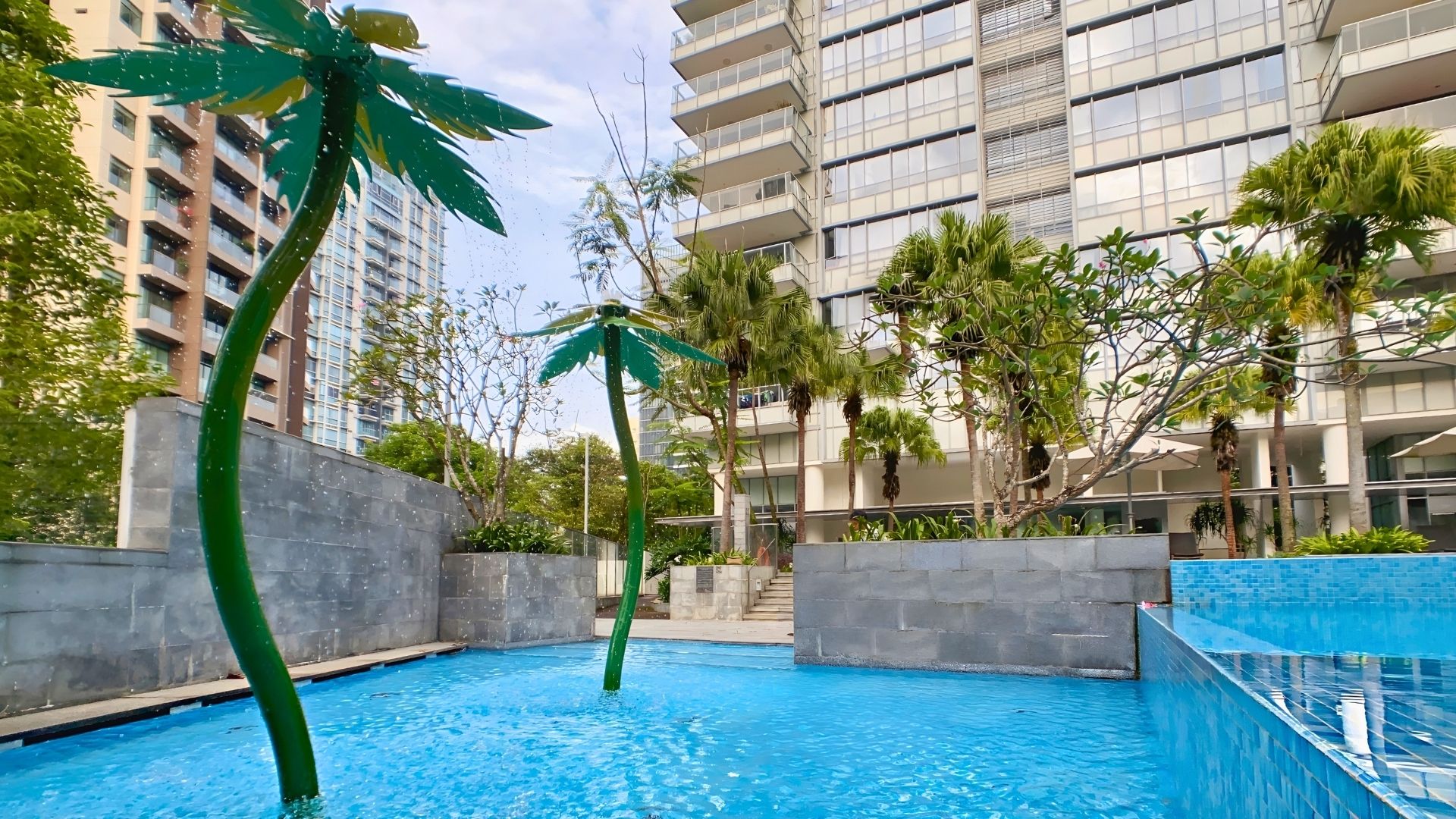 The children's wading pool — fitted with water fountain structures in the shape of curvaceous trees — at Paterson Suites condominium in Singapore.