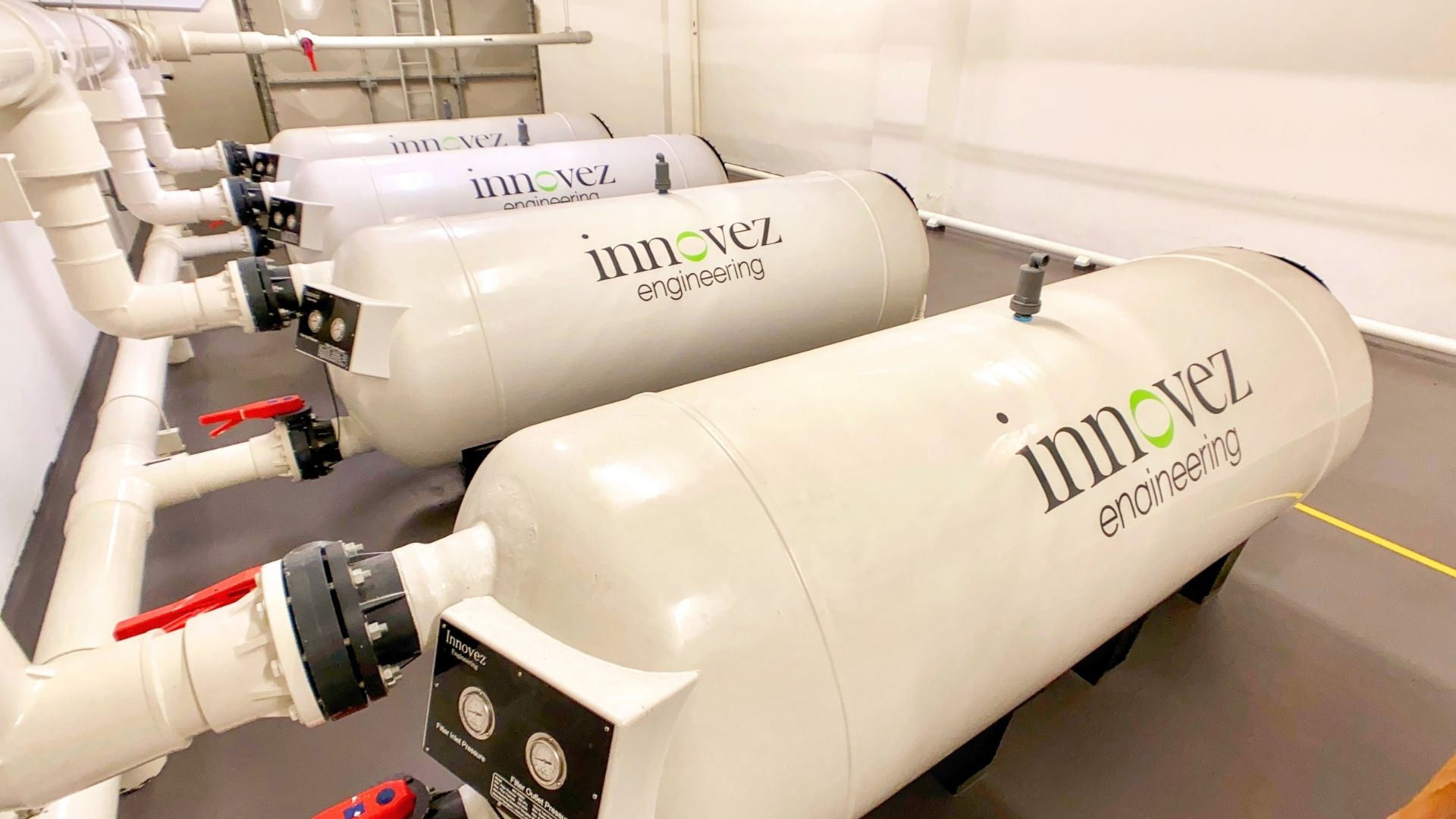 Overhaul of the pump room at the United World College Southeast Asia (UWCSEA East Campus). Four high-rate sand filters from Innovez Engineering occupy the room, with upgraded control panels and equipment.