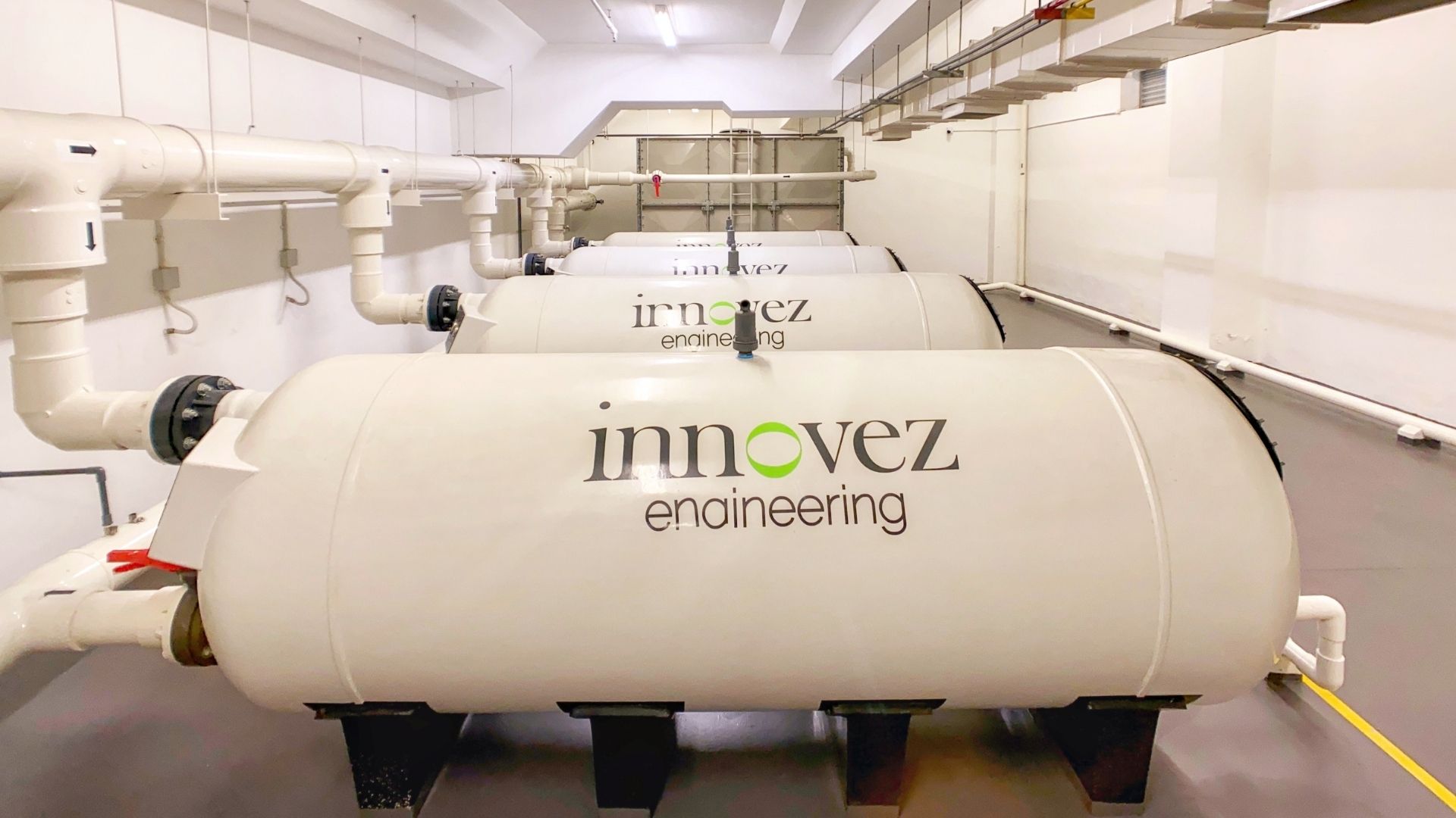 Close-up of Innovez Engineering's high-rate swimming pool sand filters, at the UWCSEA East Campus pump room.