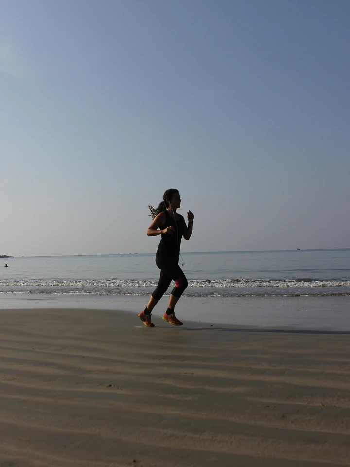 woman running near sea