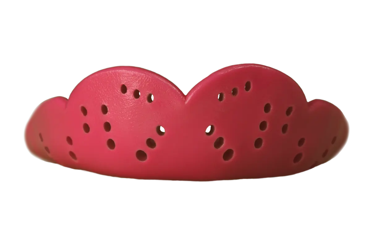 Curved red plastic piece with multiple small oval ventilation holes moutguard Sisu