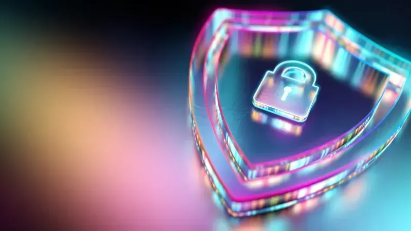 A pink and blue heart shaped lock with a key in it.