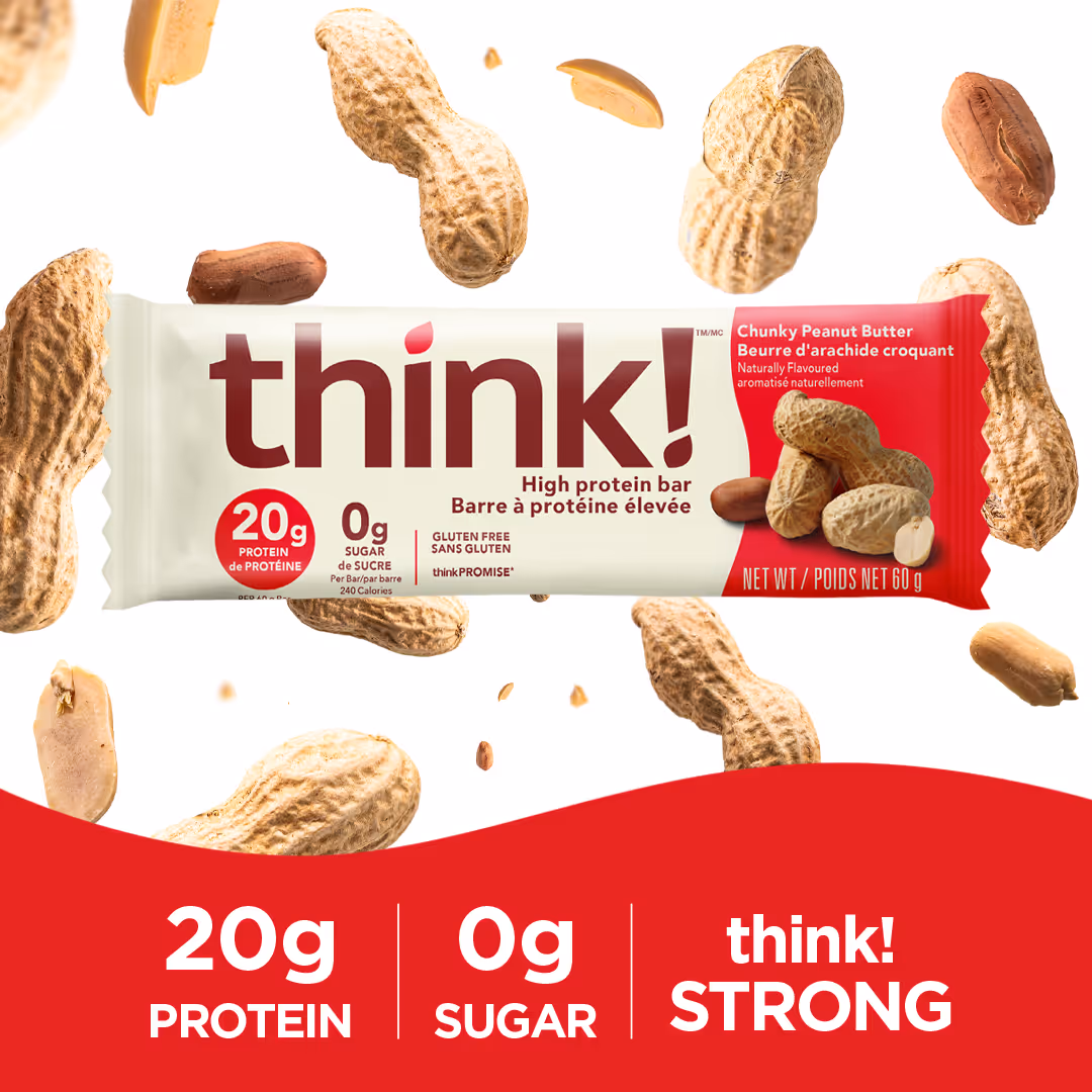 Think! Chunky Peanut Butter high protein bar with 20g protein and 0g sugar, surrounded by peanuts on a white and red background.
