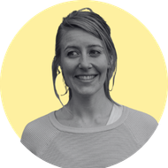 A yellow circle with a black and white photo portrait over the top