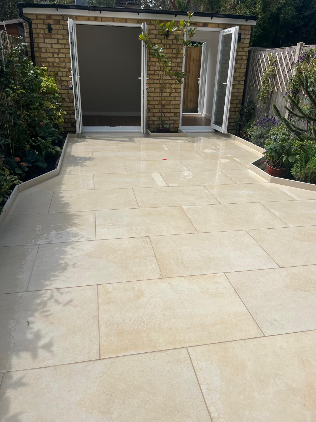 Full garden landscaping with porcelain paving and planting in Wimbledon SW19
