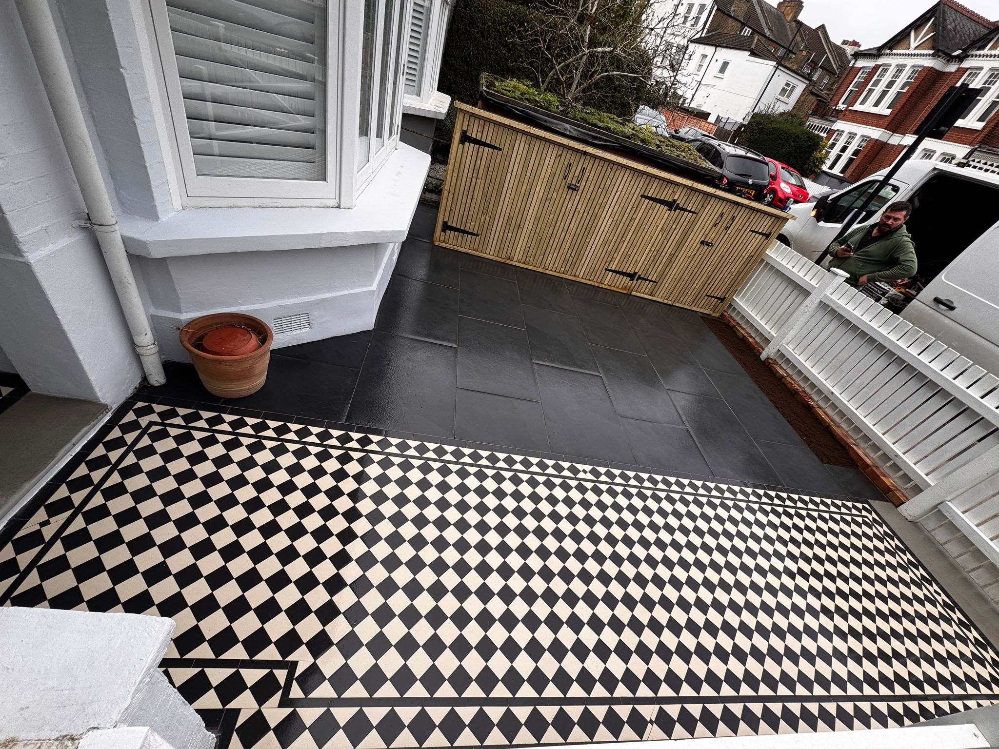 Victorian tiles alee and bespoke bike shed in London