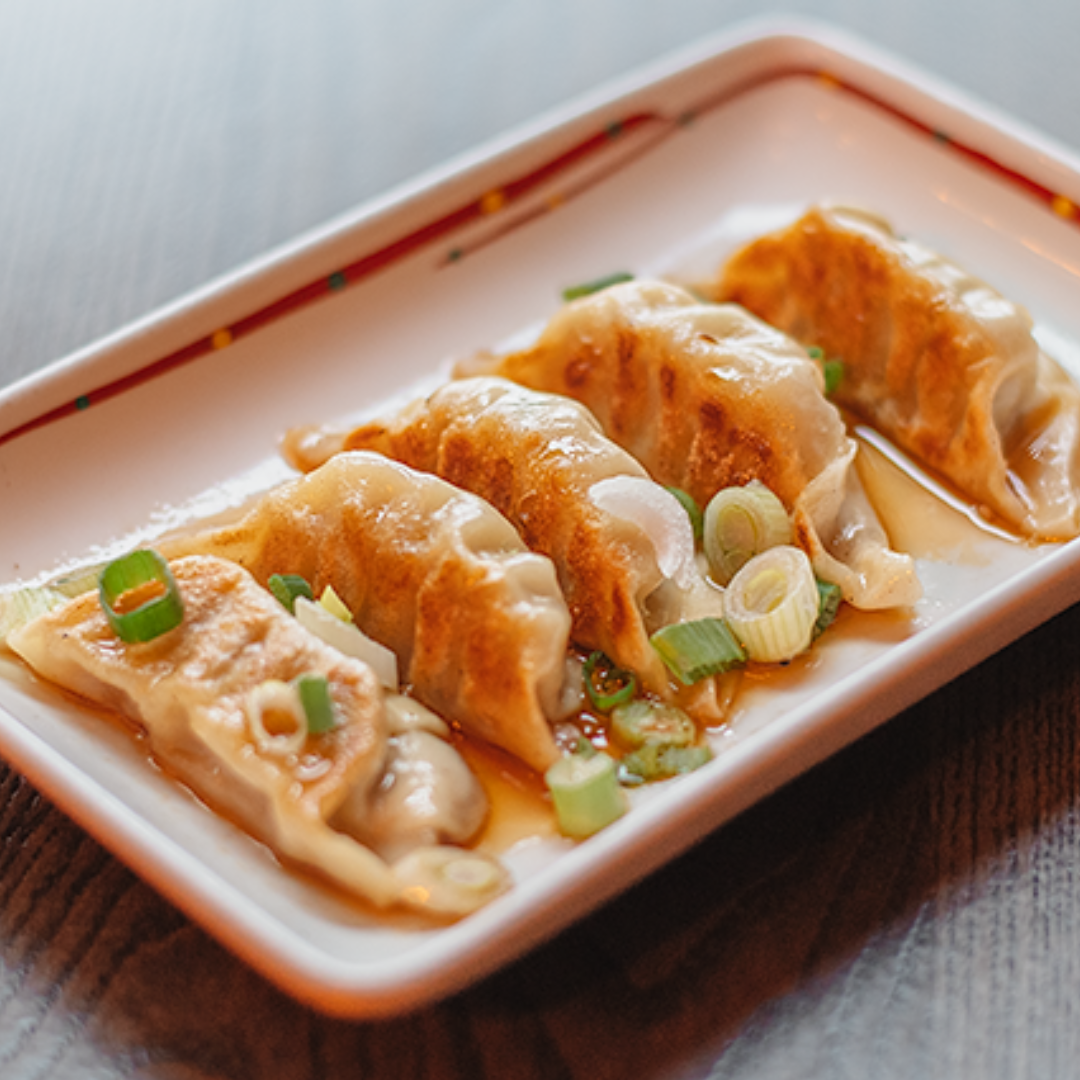 Two people cheersing at Taco Diablo Evanston