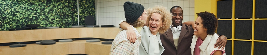 Employee team watching social-style video content for internal communications