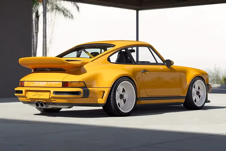 Singer’s latest reimagined 911 blends wide-body '80s looks with a 4.0L VVT flat-six, hybrid cooling, and F1-grade chassis tech from Red Bull.