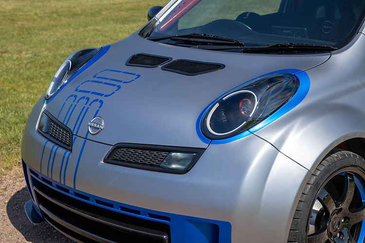 2025 Nissan Micra 350SR updated for its 23rd anniversary with satin silver wrap, blue accents, and refreshed detailing by Nissan Design Europe.