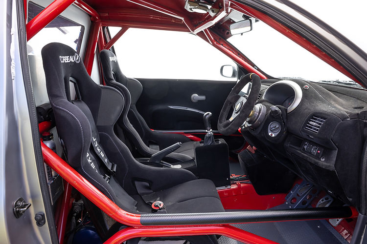 Interior - 2025 Nissan Micra 350SR updated for its 23rd anniversary with satin silver wrap, blue accents, and refreshed detailing by Nissan Design Europe.