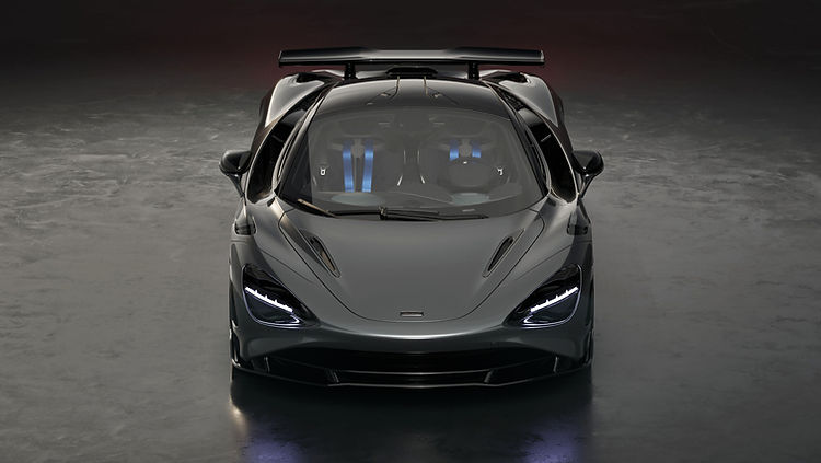 Front profile view of the McLaren 750S Le Mans Edition, showing extended carbon front splitter, five-spoke LM wheels, and Le Mans Grey paint.
