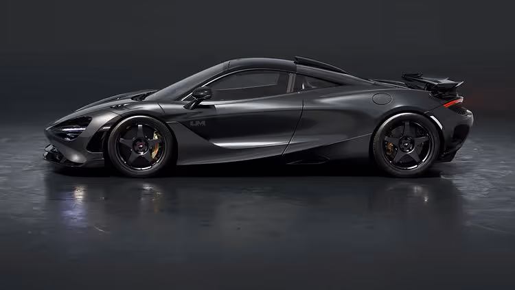 McLaren 750S Le Mans Edition in Le Mans Grey with MSO High Downforce Kit, photographed in profile against a neutral background. Le Mans Grey