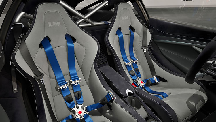 Interior of the McLaren 750S Le Mans Edition featuring Carbon Black Alcantara with Dove Grey accents and bespoke Le Mans branding on the headrests.