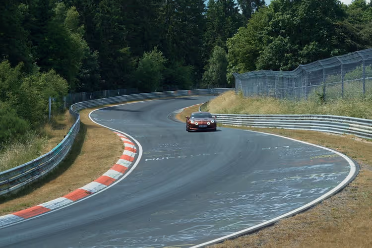Alpine A110R Ultime cornering at high speed on the Nürburgring Nordschleife during record lap attempt