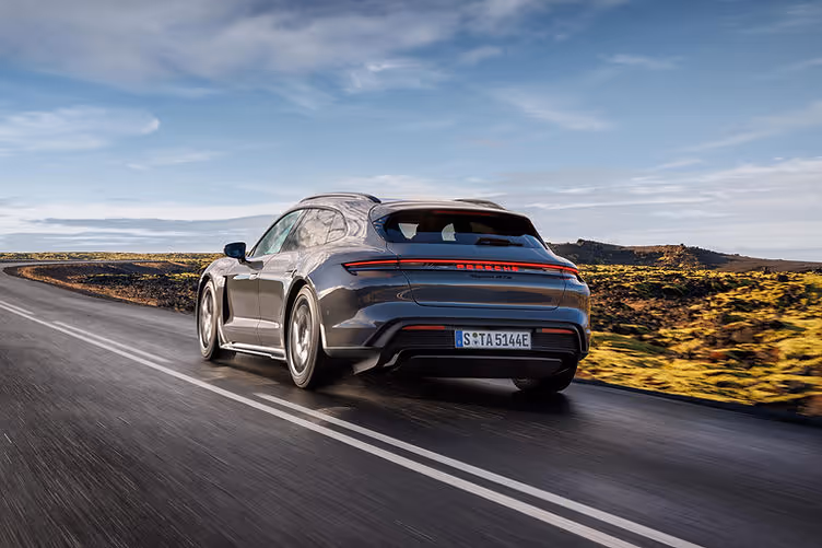 Porsche Taycan GTS Sport Turismo driving rear