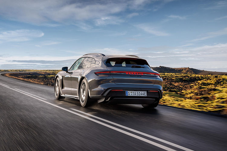 Porsche Taycan GTS Sport Turismo driving rear