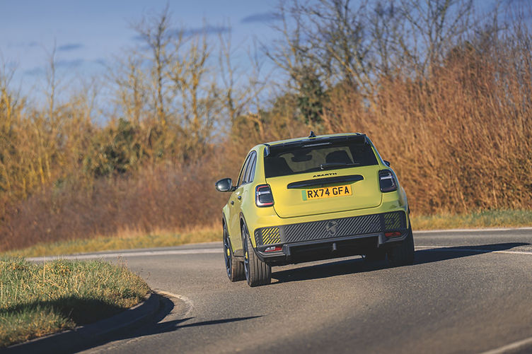 Abarth 600E rear cornering shot dynamic