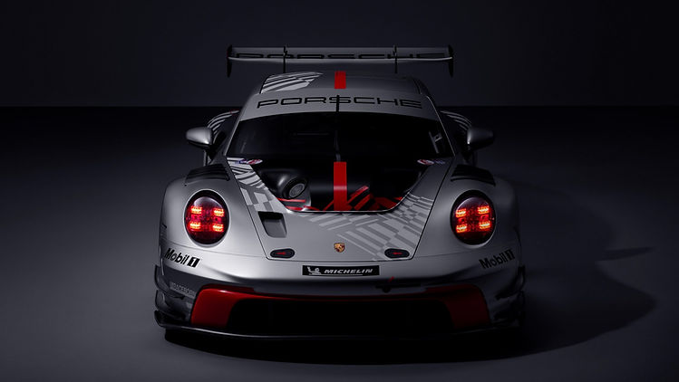 Head on static profile image of Porsche 911 GT3 R (Model Year 2026), 2025, Porsche AG shot in a dark grey studio