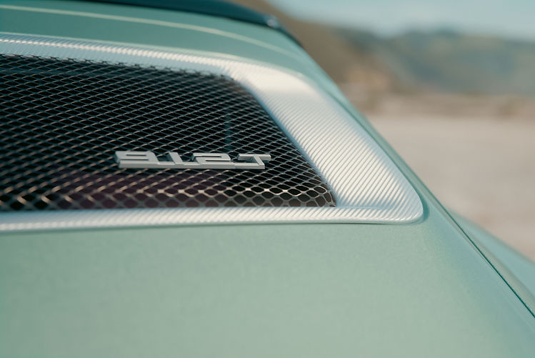 KAMM Launches More Refined 912T - close up of rear carbon bonnet and badge