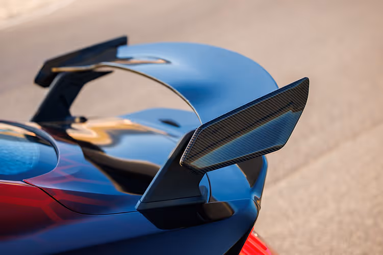 Close-up of the Shelby Super Snake-R’s carbon fibre pedestal rear wing, highlighting its sculpted endplates and track-focused aerodynamic design.