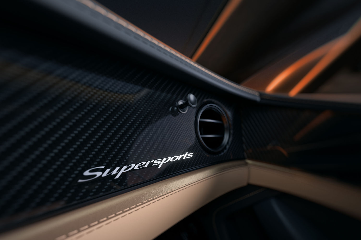 2026 Bentley Continental GT Supersports - interior detail of carbon fibre dashboard